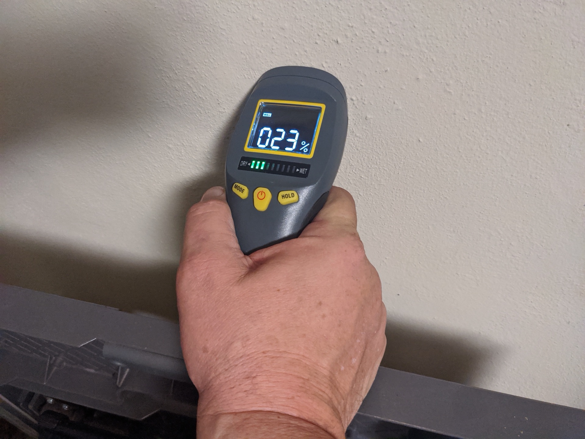 Water intrusion moisture meter reading